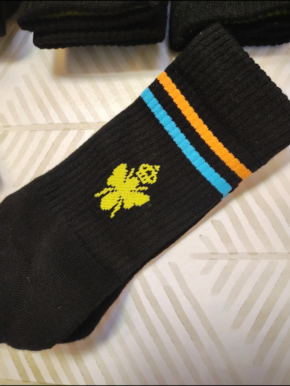 Bombas Black Crew Socks with Orange, Blue and Lime Accents Xs‎